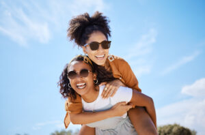 eye protection tips women with sunglasses outside