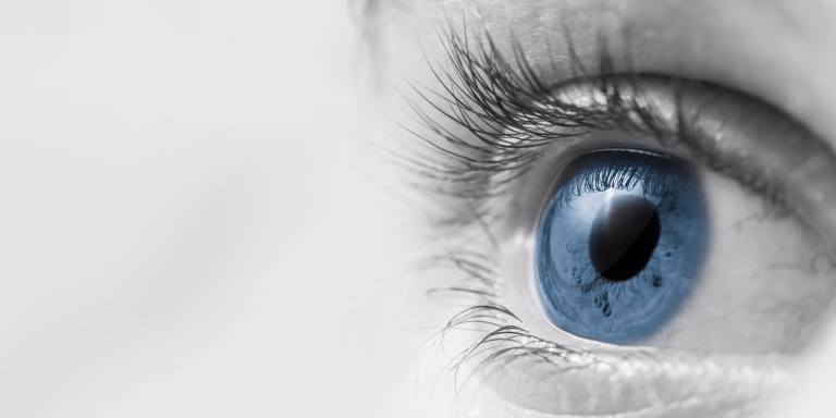 Close-up of a healthy blue eye representing Advanced Eye Care Center's commitment to exceptional vision care.